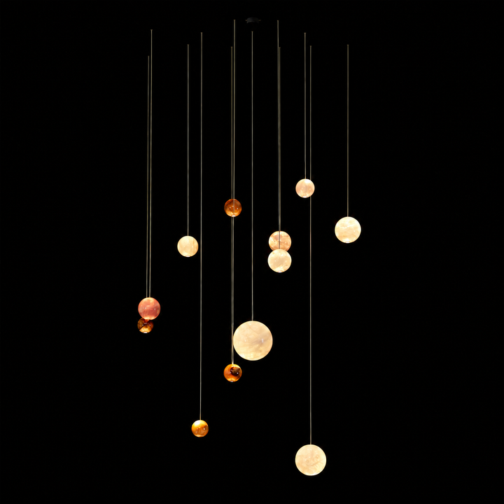 Cosmos natural agate pendant light cluster with handcrafted illuminated stone spheres in custom suspended configuration.