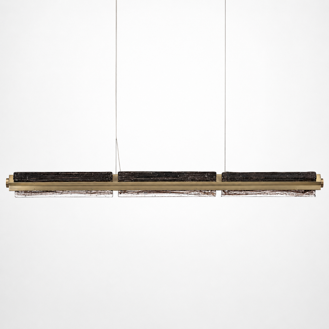 Custom length linear pendant light with European hand-blown textured glass.