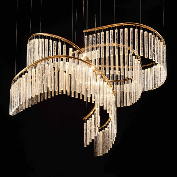 Lucretia Eden custom pendant 16B with dual curved brass frame and cascading crystal glass tubes for luxury stair void lighting