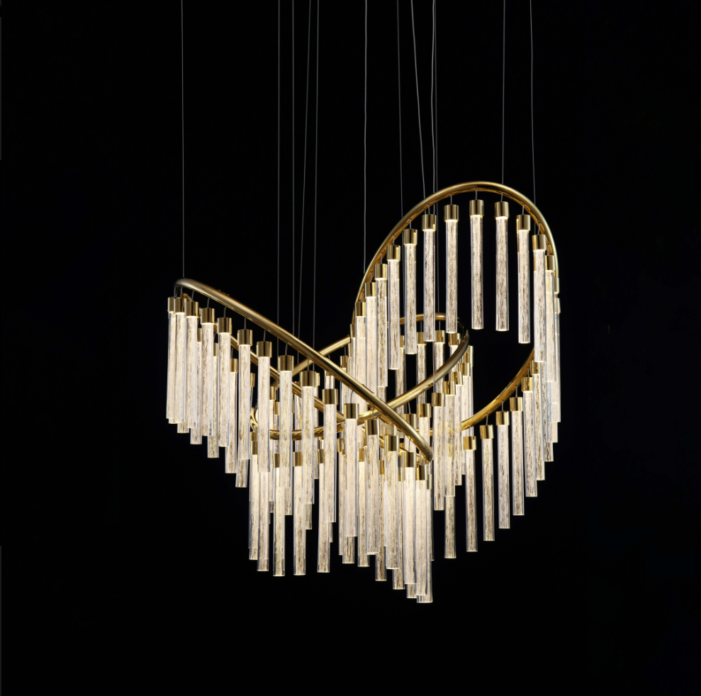 Lucretia Eden custom pendant featuring sculptural crystal glass tubes and curved brass frame for luxury stair void lighting