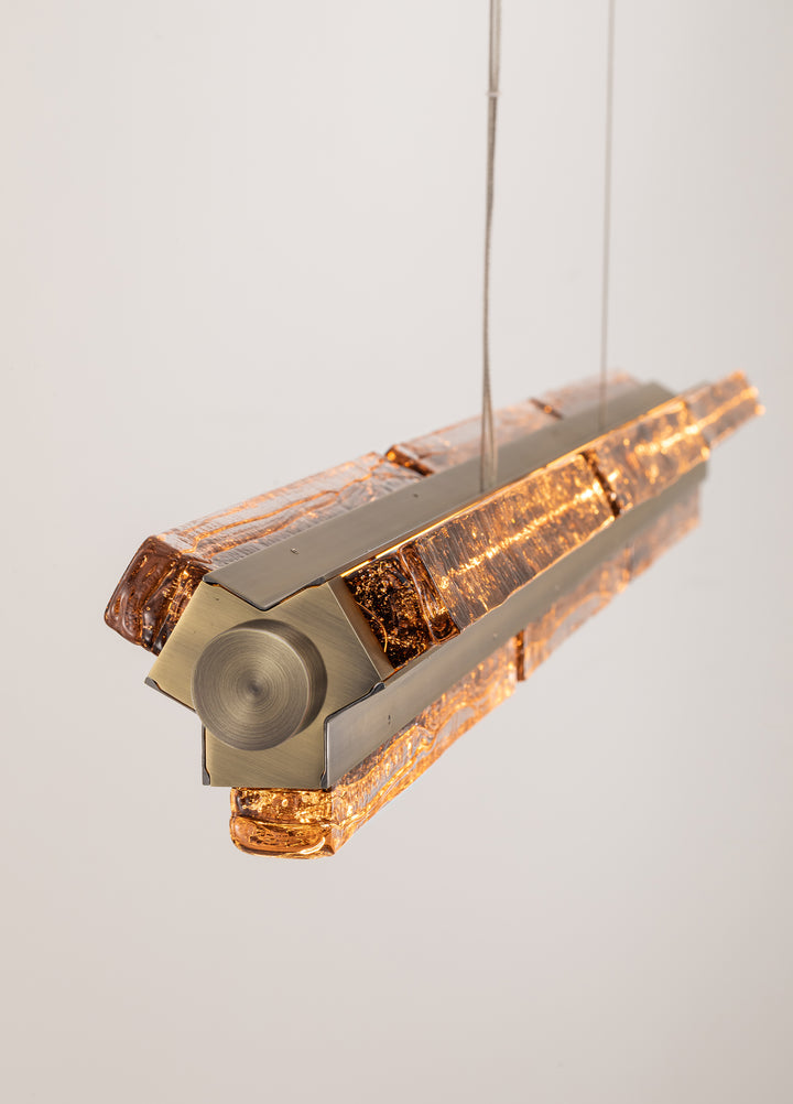 Close-up of European hand-blown textured glass on the Running Water Horizon pendant.