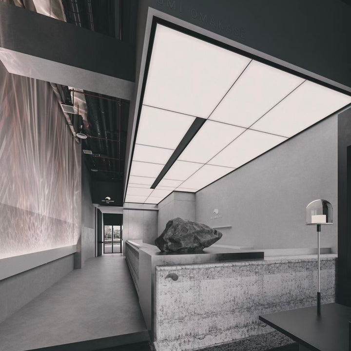 Lucretia hospitality LED stretch ceiling illuminating a modern restaurant entrance with seamless backlit panels.