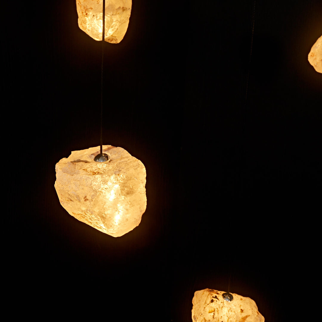 Close-up of two Aether Brazilian Natural Crystal Pendant Lights highlighting the unique shape and natural beauty of genuine Brazilian crystal.