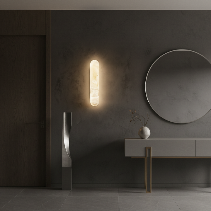 Alabaster Arc wall light illuminating a contemporary entryway with soft ambient lighting ideal for home lighting and modern interior wall light design.