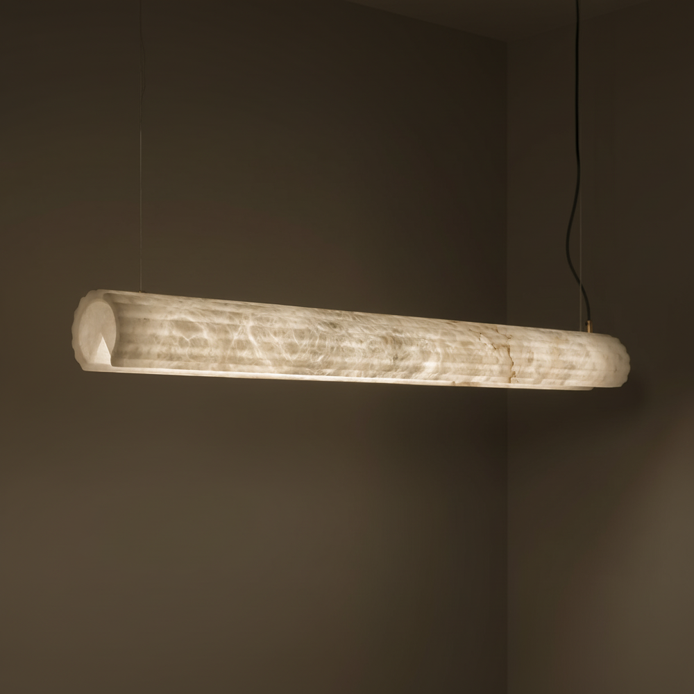 close up of Alabaster Flute linear pendant in carved Spanish alabaster with integrated LED for modern architectural lighting