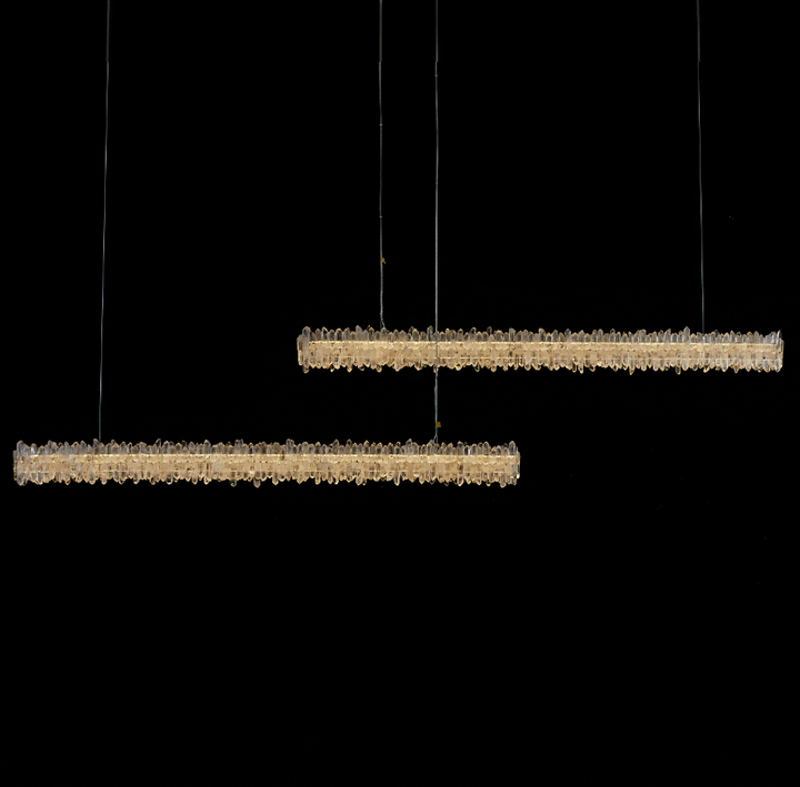 Belo Glacia double layer crystal linear pendant light creating luminous architectural LED lighting above long dining and kitchen surfaces