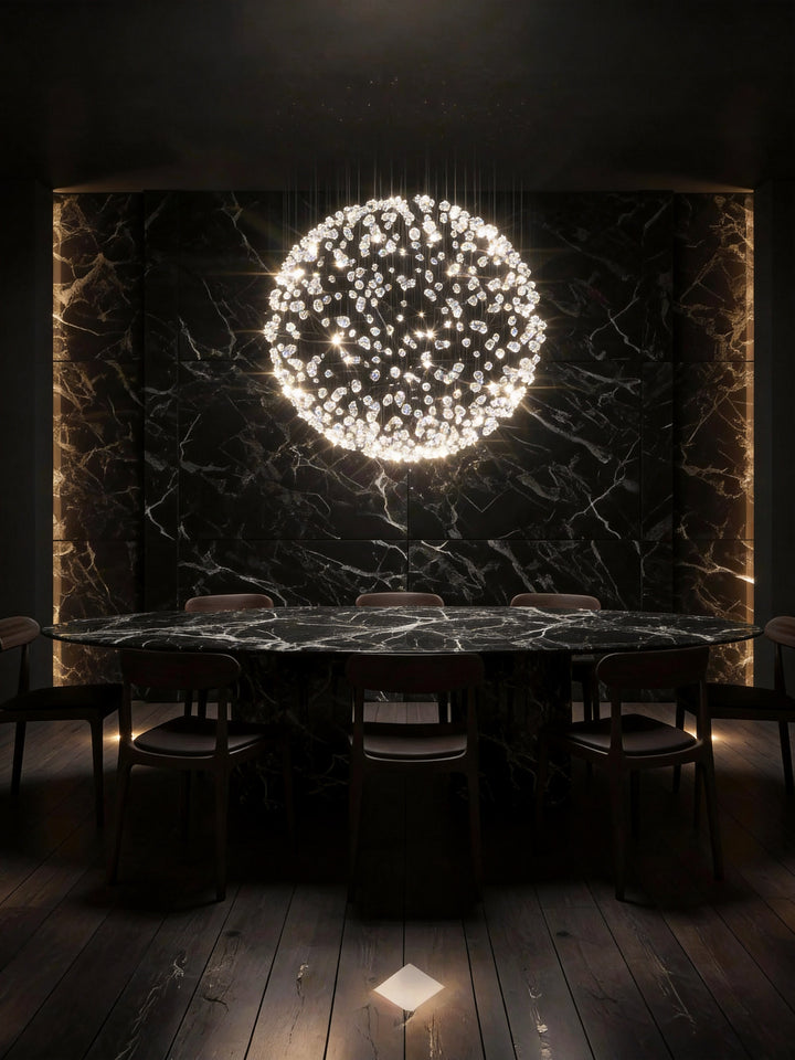 Lucretia Lighting bespoke sphere pendant light providing luxury custom lighting above a dining room setting with sculptural designer detailing