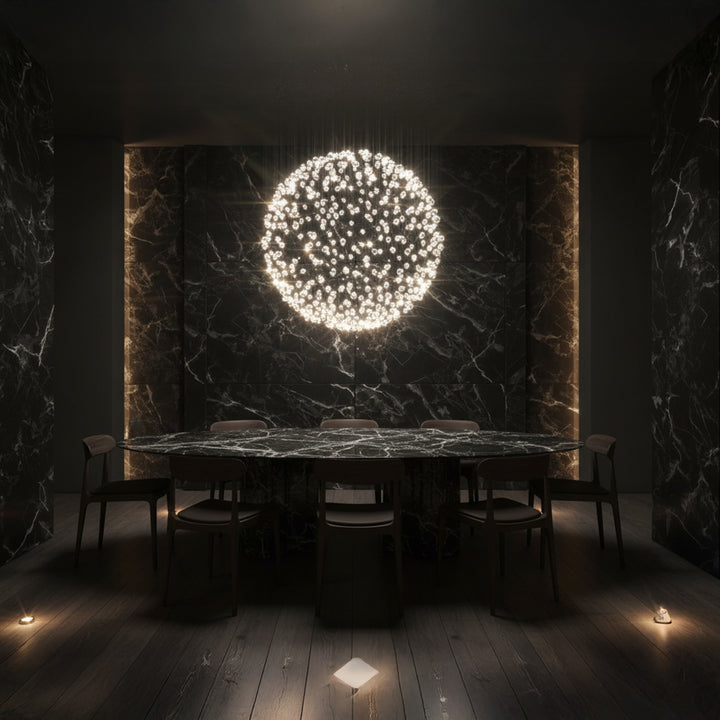 Lucretia Lighting bespoke sphere pendant light providing luxury custom lighting above a dining room setting with sculptural designer detailing