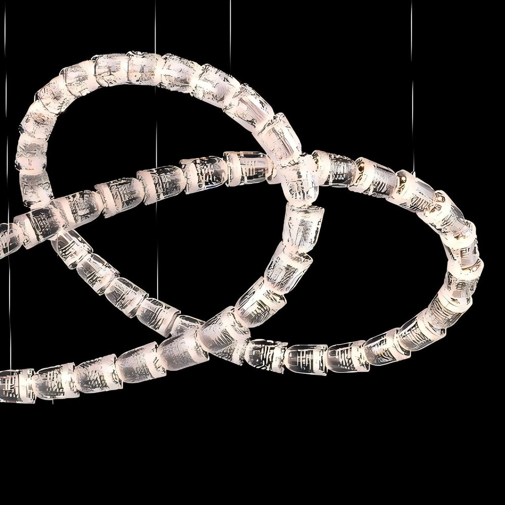 Lucretia Lighting Serpentine Crystal Flow bespoke pendant light featuring an artistic crystal structure with flowing custom luxury lighting