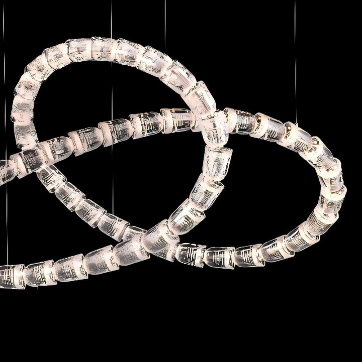 Lucretia Lighting Serpentine Crystal Flow bespoke pendant light featuring an artistic crystal structure with flowing custom luxury lighting