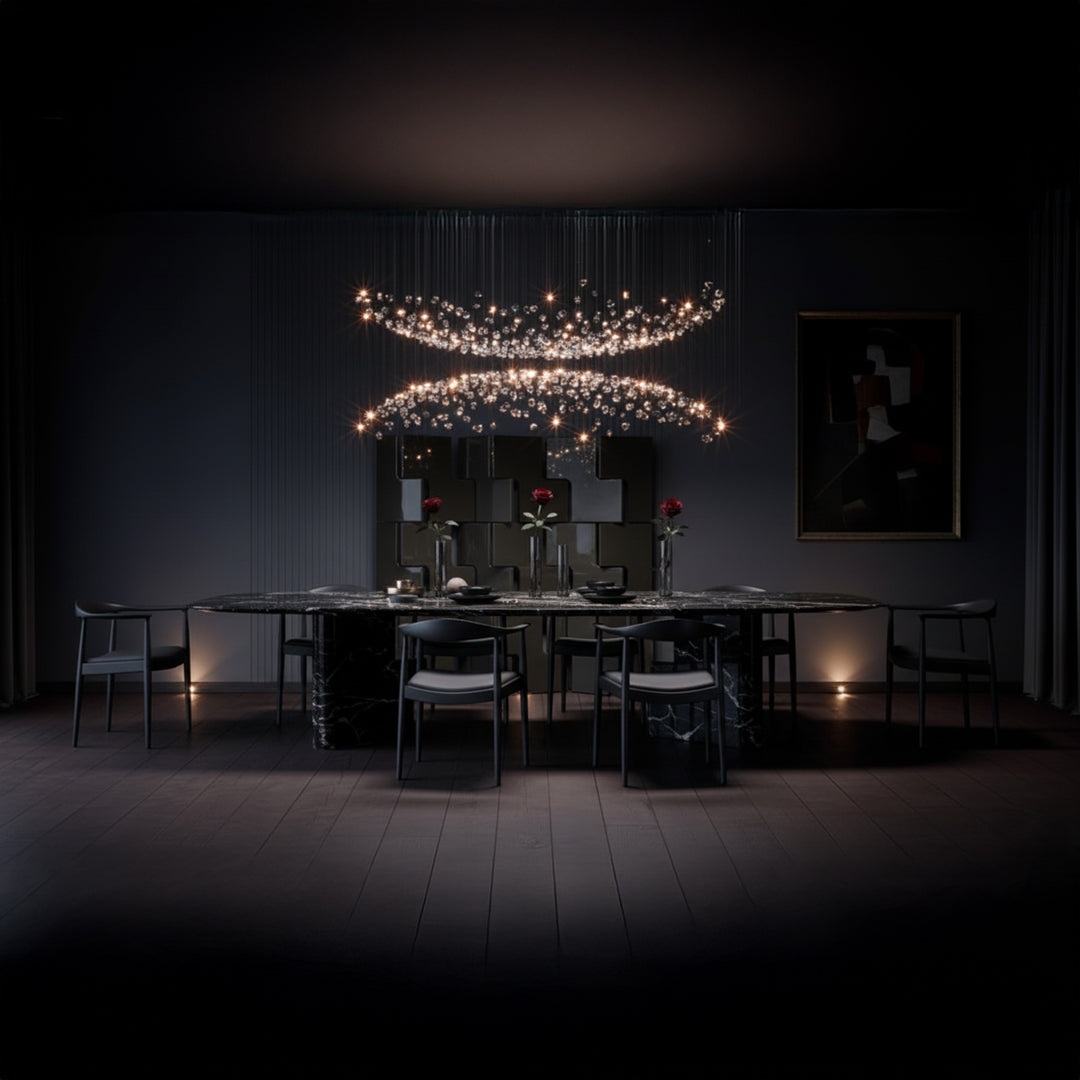 Lucretia Lighting bespoke pendant light in a sculptural spiral form illuminating a luxury dining room setting with refined custom lighting design