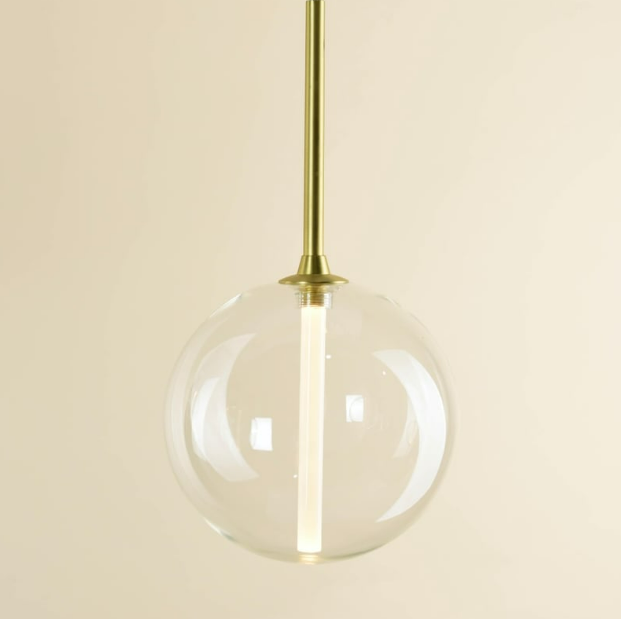 close-up of a single glass sphere from the Bolle 5B Pendant Light highlighting minimalist designer lighting details