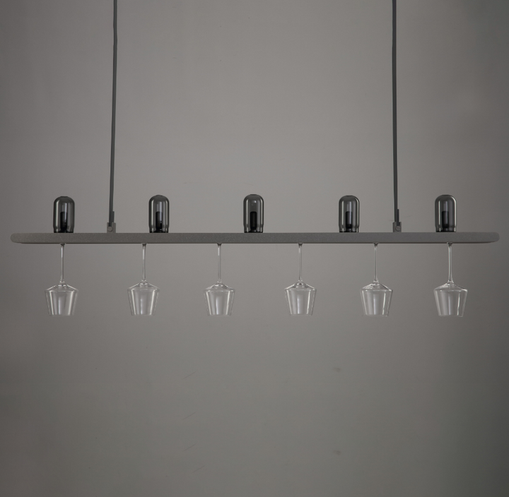 close up of Connaught Bar Linear Pendant Light featuring silicone straps and LED bar lighting