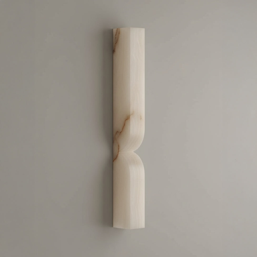 Cordoba 600 alabaster wall lamp with elongated sculptural form providing soft ambient lighting ideal for modern interiors and decorative wall lighting.