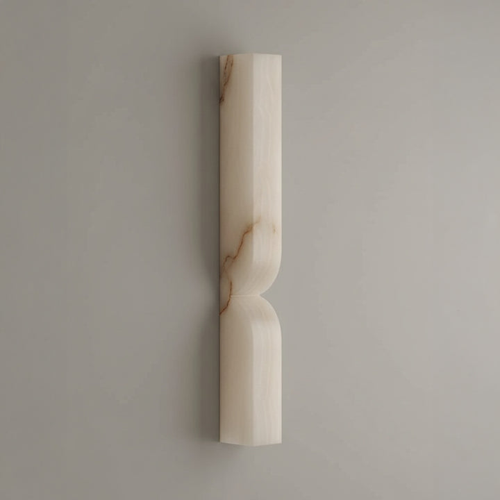 Cordoba 600 alabaster wall lamp with elongated sculptural form providing soft ambient lighting ideal for modern interiors and decorative wall lighting.