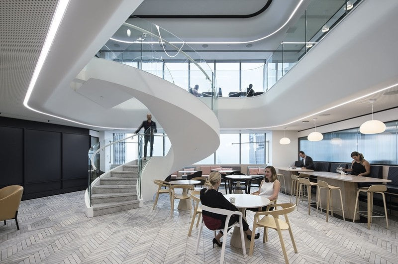 Lucretia Lighting FlexCurve CR50N recessed curved LED linear lighting installed in a modern office space with seamless ceiling integration