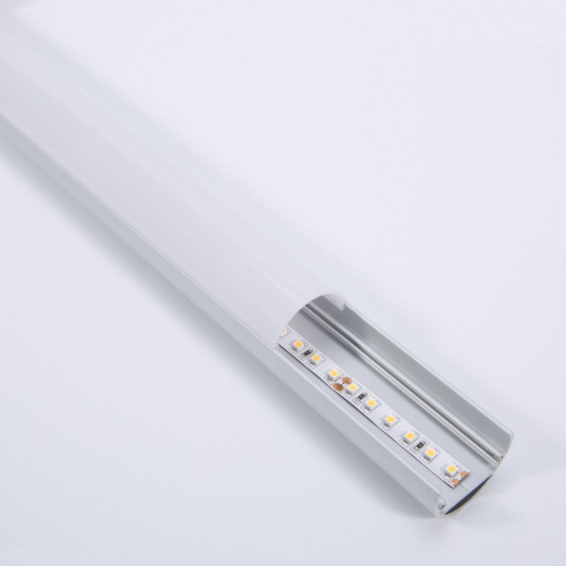 Close-up detail of the FlexGlow R34 round LED linear light showing endcap and internal LED module