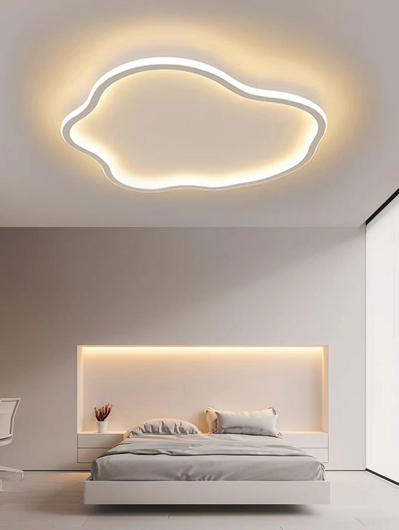 FlexHalo CS35D sculptural curved dual-emission LED linear light installed in bedroom feature ceiling providing soft upward and downward illumination