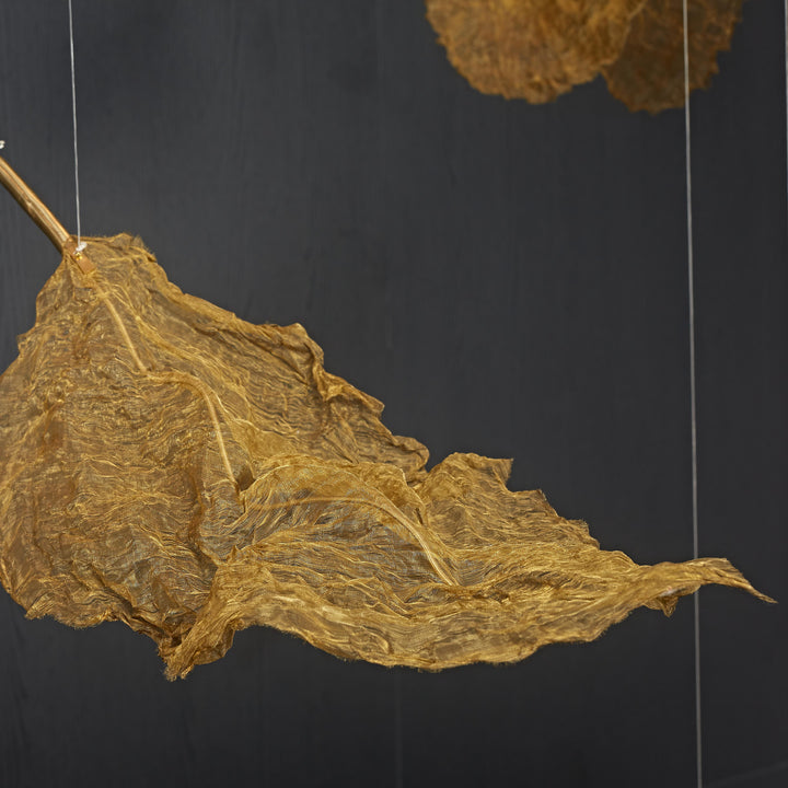 Precision-crafted sculptural branch supporting the handcrafted metallic woven Gilded Leaf Pendant Light.