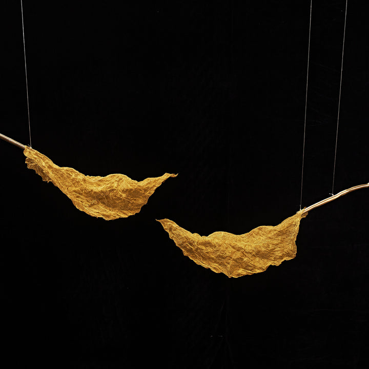 Handcrafted Gilded Leaf Pendant Light featuring metallic woven leaf sculptures suspended from sculpted branches.