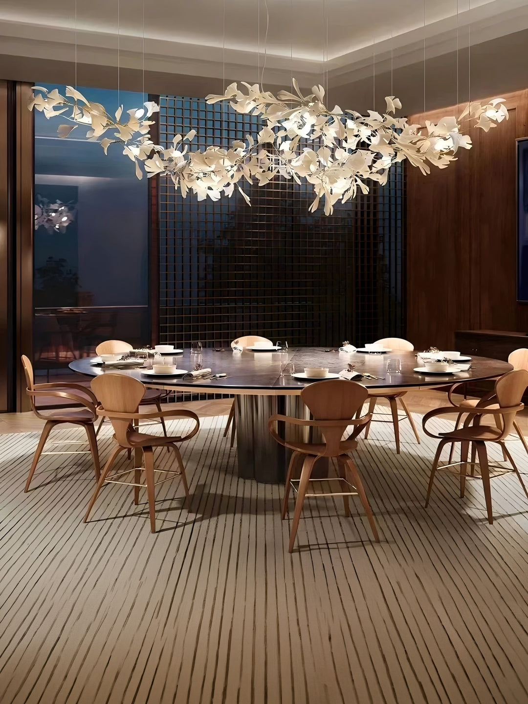 Lucretia Lighting Ginkgo Leaf bespoke chandelier crafted in ceramic displayed as a sculptural custom lighting centrepiece