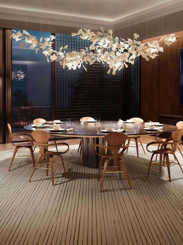 Lucretia Lighting Ginkgo Leaf bespoke chandelier crafted in ceramic displayed as a sculptural custom lighting centrepiece