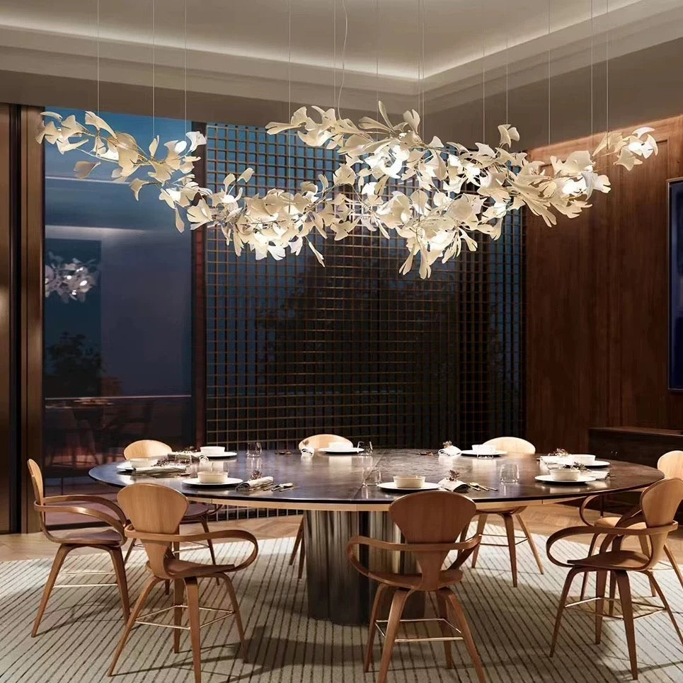 Lucretia Lighting Ginkgo Leaf bespoke chandelier crafted in ceramic displayed as a sculptural custom lighting centrepiece