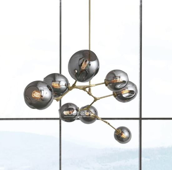 Glass Bubble Pendant 8 by Lucretia Lighting showing adjustable brass arms with eight glass bubbles