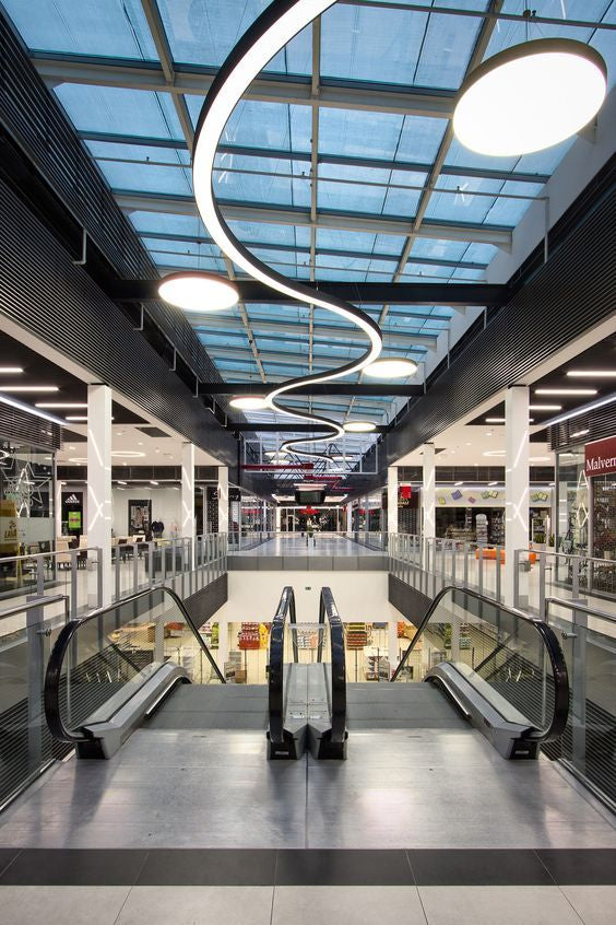 Lucretia Lighting Lumicurve bespoke linear curve LED system featured in commercial architectural lighting design