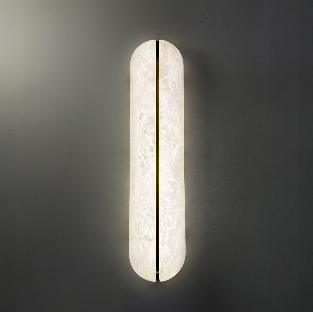 Lumin Edge Alabaster Wall Light modern LED wall lamp with slim Spanish alabaster panel and brass edge frame providing warm ambient interior lighting.