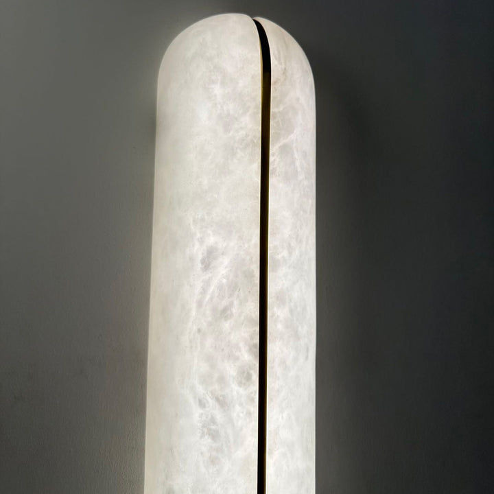 Lumin Edge Alabaster Wall Light slim Spanish alabaster panel detail showcasing soft translucent glow and contemporary brass edge design.