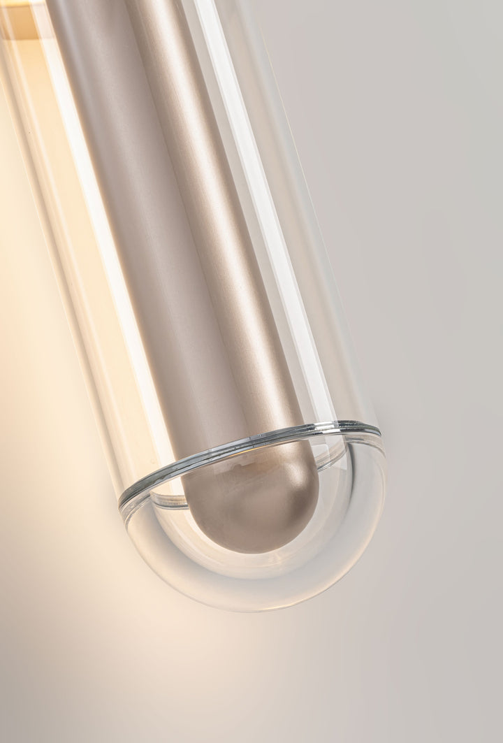 LumiTube LED wall lamp detail image featuring acrylic and glass tube with warm ambient glow for contemporary interior lighting