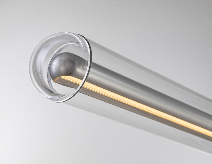 close up end detail of LumiTube glass linear pendant showing softly diffused LED light through clear glass