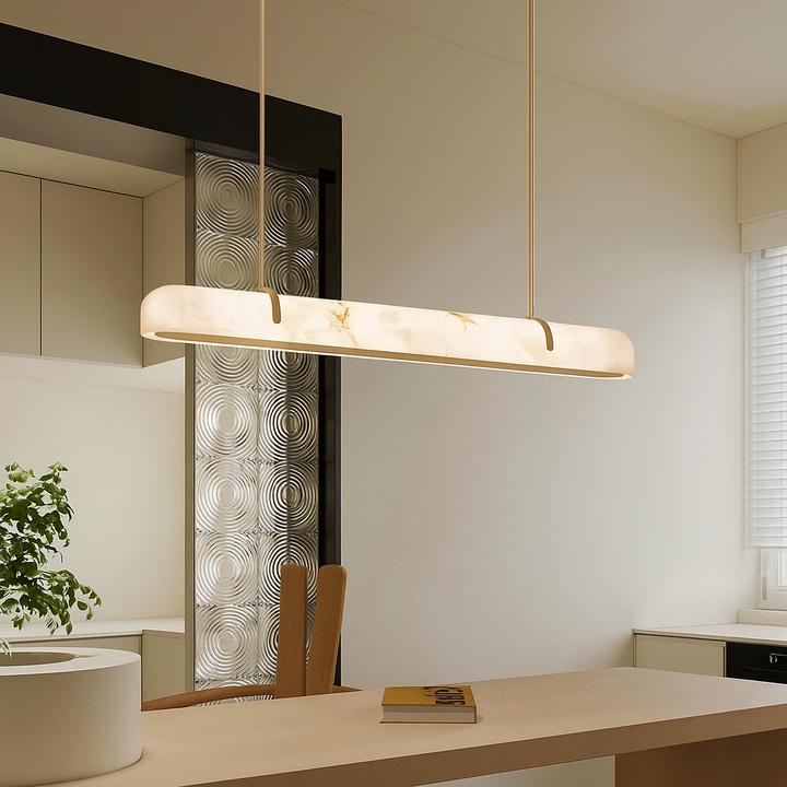 LunaBar LED linear pendant light in Spanish alabaster providing warm designer lighting above a modern kitchen island in Australia
