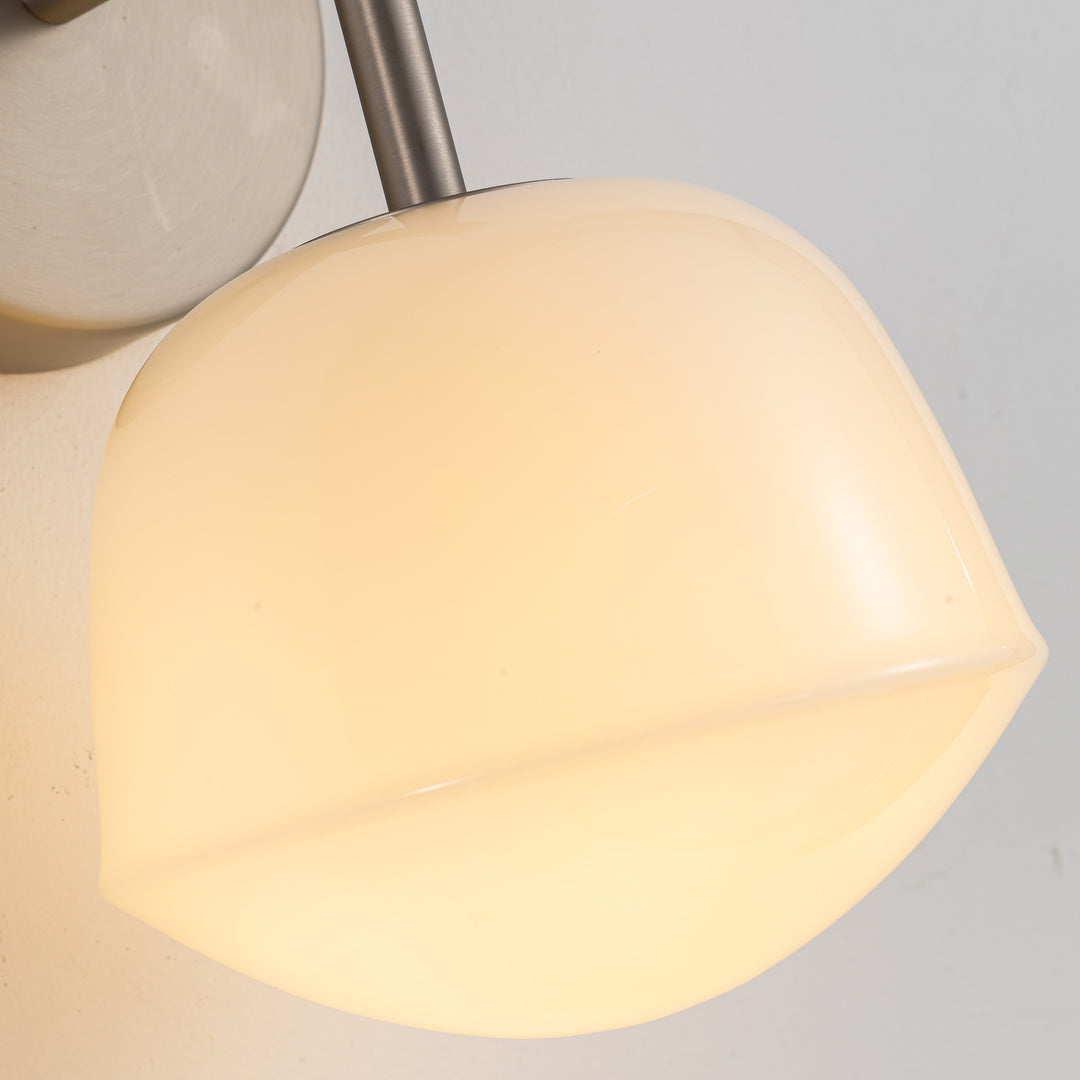 Opalea 150 Wall Light opal glass shade detail with brushed nickel mount, contemporary LED wall light with warm soft illumination
