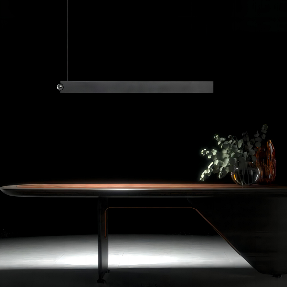 Orbit linear pendant light with touch sensor control providing direct and indirect LED lighting above modern dining table
