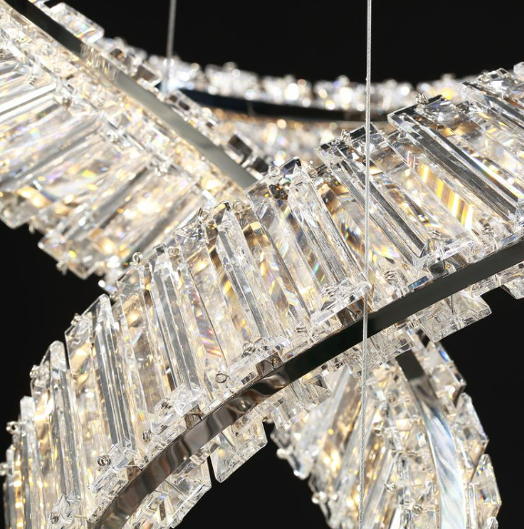 Close-up of the Pharaoh Infinity 1600 Pendant Light displaying premium crystal detailing and sculptural infinity-ring form