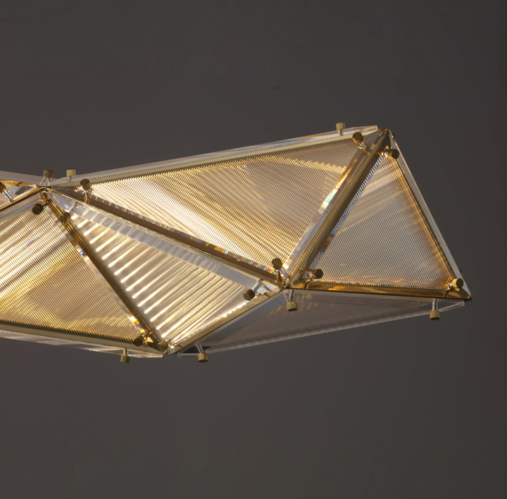 Lucretia Lighting Proteus custom pendant used as modern dining area designer lighting with strong visual impact and soft ambient glow