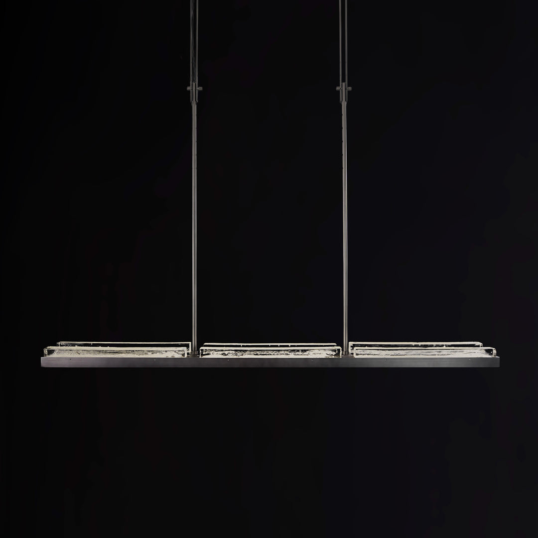 Lucretia Lighting Running Water linear pendant light in brushed black finish with suspended rods over modern dining table