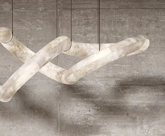 Lucretia Lighting Sereno Twist alabaster bespoke pendant light showcasing sculptural stone design and warm diffused glow