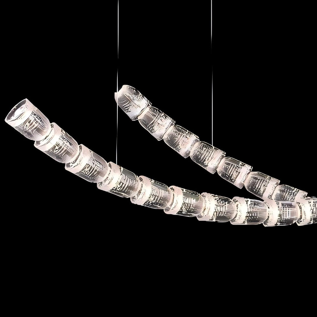 Lucretia Lighting Serpentine Crystal Flow bespoke pendant light shown in a detailed close-up highlighting its custom crystal lighting segments
