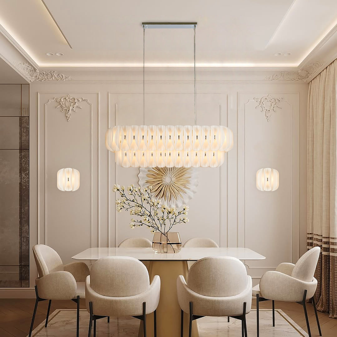 Lucretia Lighting Solvia Cascade 1540 pendant light installed above dining table with warm amber glass glow in luxury dining room