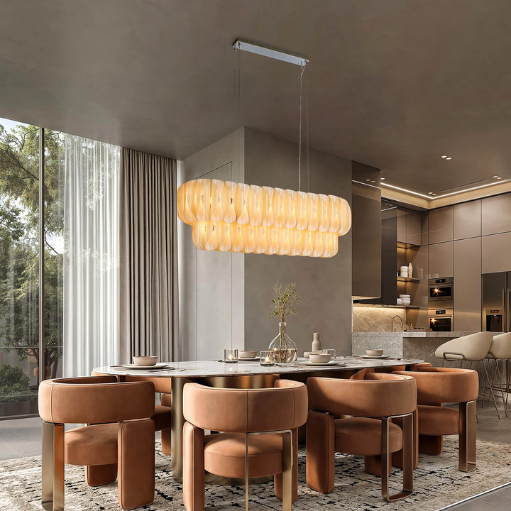 Lucretia Lighting Solvia Cascade 1540 pendant light used in luxury hotel dining interior with warm architectural lighting atmosphere