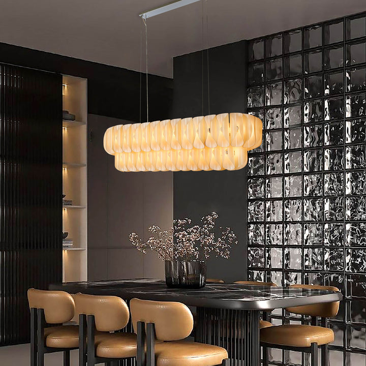 Lucretia Lighting Solvia Cascade 1540 designer pendant light installed in upscale restaurant dining space with ambient glow
