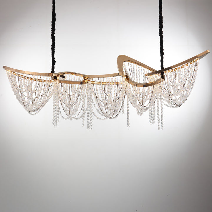 Lucretia Lighting close-up of the Starlit Grace 2000 gold frame and cascading crystal chain detailing