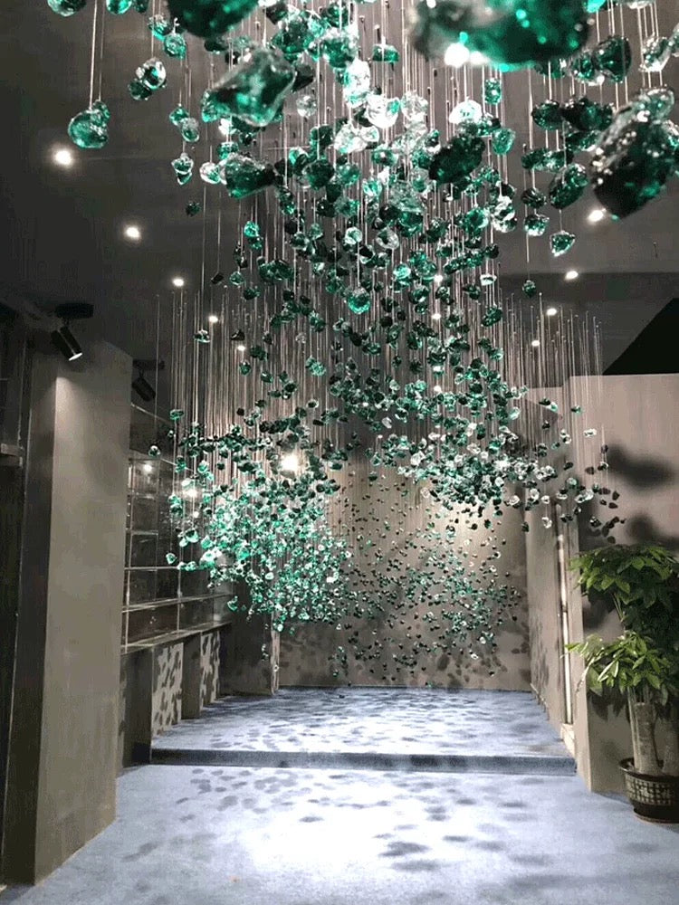 Lucretia Lighting StoneLuxe custom crystal stone installation suspended in a modern void space