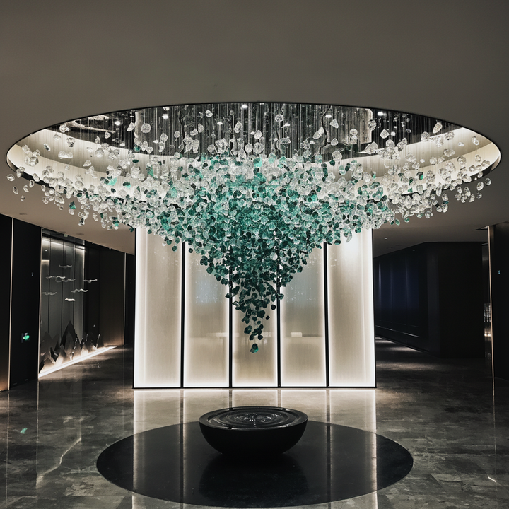 Lucretia Lighting StoneLuxe bespoke hanging stone sculpture installation in a luxury hotel lobby