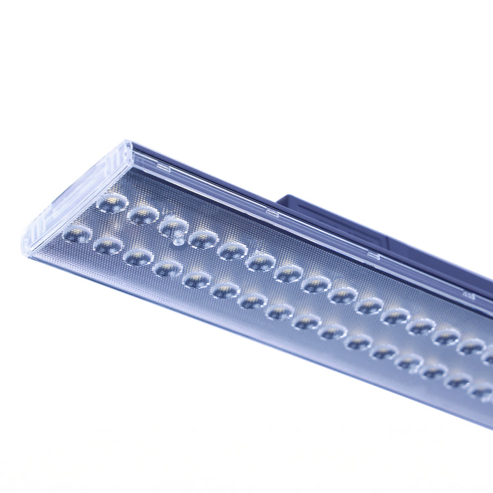 Lucretia Lighting K1 edge linear track light illuminating supermarket aisles with uniform CRI95 lighting