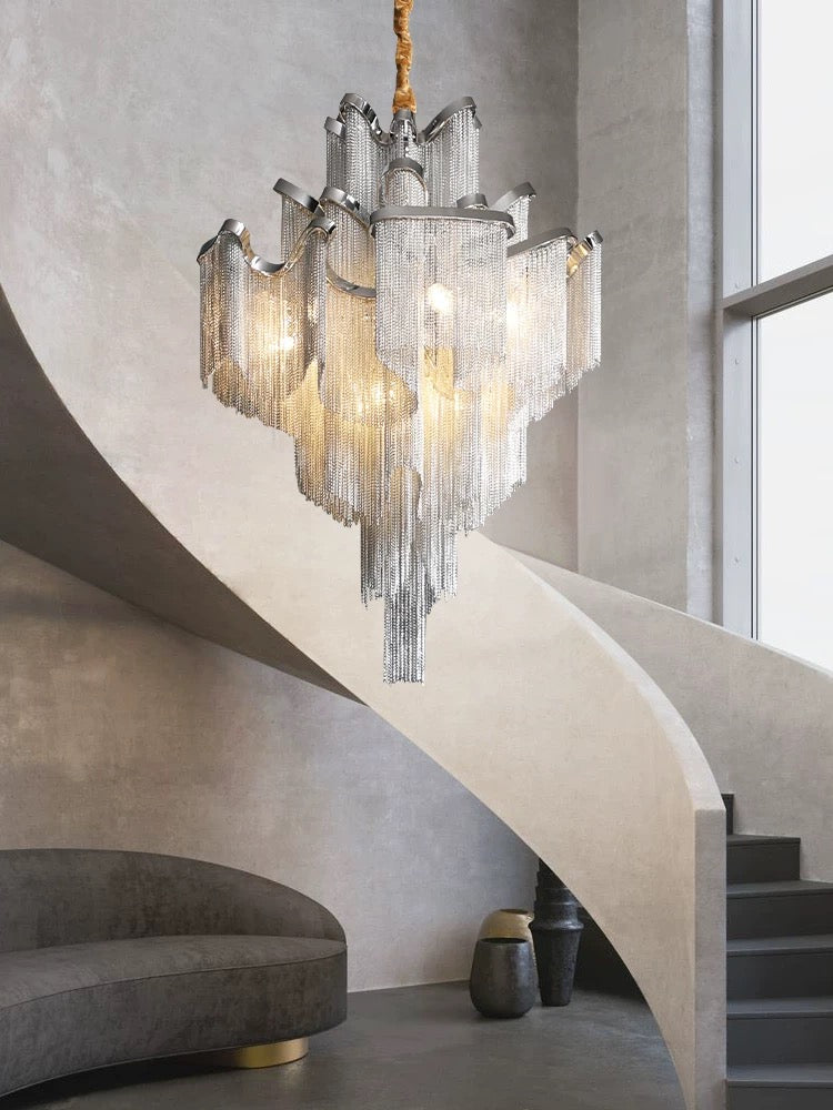 Lucretia Lighting Tassel Phantom bespoke tiered chandelier creating a designer stair void pendant feature