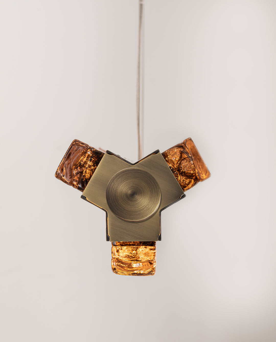 End detail of the Running Water Horizon luxury architectural pendant.